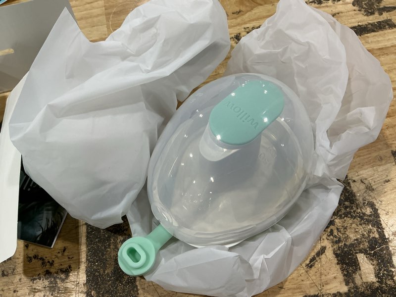 Condition photo showing As Is for willow wave - wearable manual breast pump - fits fully in bra - ergonomic handle - 24mm soft silicone flange - wearable breastfeeding pump - hospital grade suction - postpartum essentials - holds 5oz wave - single manual pump