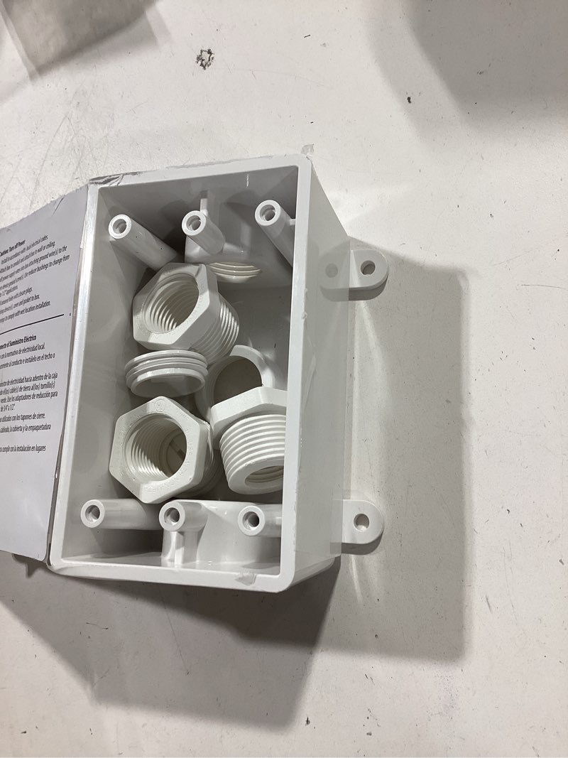 Condition photo showing Good Condition for n3r nonmetal white 1-gang weatherproof electrical box, 3 outlets at 1/2-in. or 3/4-in., with plugs and bushings