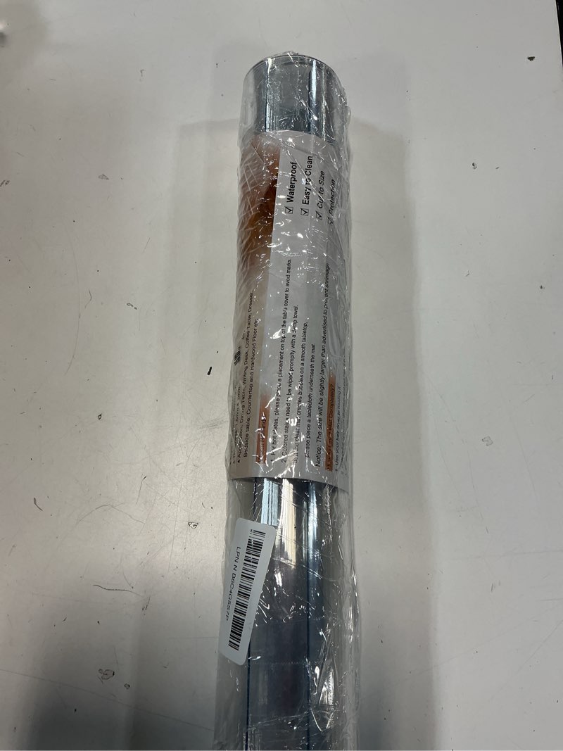 Condition photo showing New/Like New for LovePads Clear Desk Mat 16 x 51 Inch, 1.5mm Thick Clear Table Protector, Waterproof Plastic Table Cover Protector, PVC Desk Protector Mat, Vinyl Desk Cover for Desktop, Coffee & Dining Table 16" x 51" (Rectangular) Clear 1.5mm