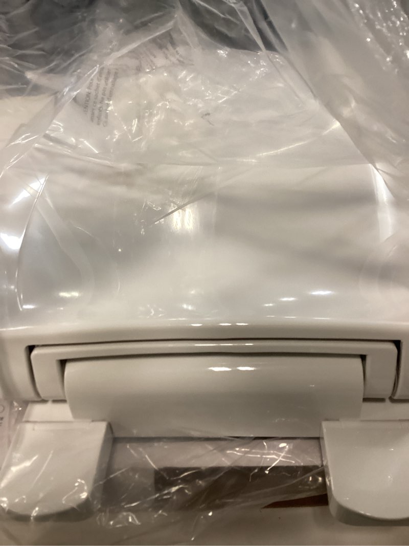 Condition photo showing Good Condition for american standard mightytuff plastic white elongated soft close toilet seat