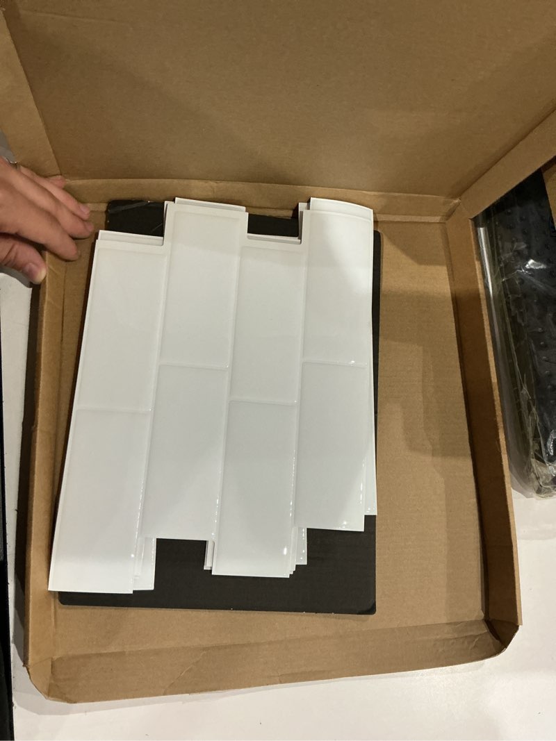 Condition photo showing As Is for novabright 10 sheet white peel and stick backsplash tile 12 x 12 in rectangle subway self adhesive wall tiles for kitchen wall bathroom countertops