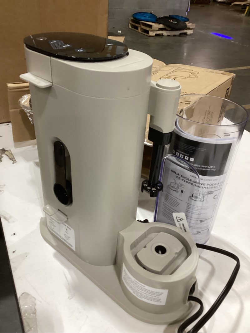 Condition photo showing Good Condition for Ninja Pod & Grounds Specialty Single-Serve Coffee Maker, K-Cup Pod Compatible, Brews Grounds, Compact Design, Built-In Milk Frother, 56-oz. Reservoir, 6-oz. Cup to 24-oz. Mug Sizes, Stone, PB051ST