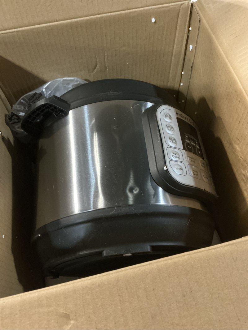 Condition photo showing As Is for instant pot duo 7-in-1 mini electric pressure cooker, slow rice cooker, steamer, sauté, yogurt maker, warmer & sterilizer, includes free app with over 1900 recipes, stainless steel, 3 quart