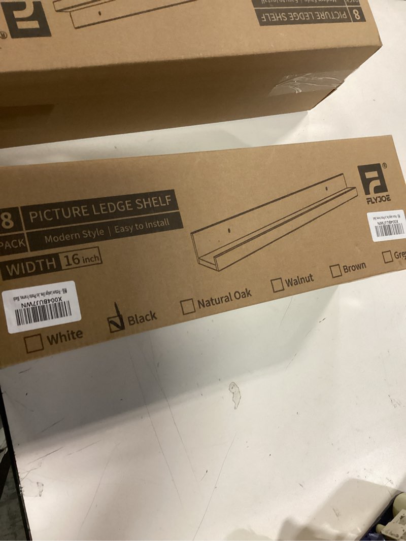 Condition photo showing New/Like New for FLYJOE Picture Ledge Shelf, Small Floating Shelves Set of 8, 16 Inches Nursery Book Shelves for Toys Storage, Kids Bookshelf Wall Mounted for Living Room Bedroom Decor Books Photo Frames, Cool Black 16'', Set of 8 Black