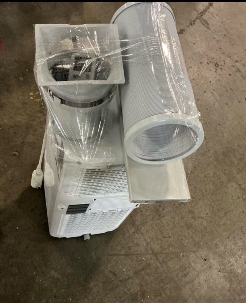 Condition photo showing As Is for 6,000 btu (sacc) / 8,765 btu (ashrae) portable air conditioner cools up to 250 sq.ft