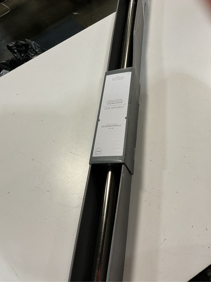 Condition photo showing New/Like New for threshold curtian rod 36”-66” brushed nickle