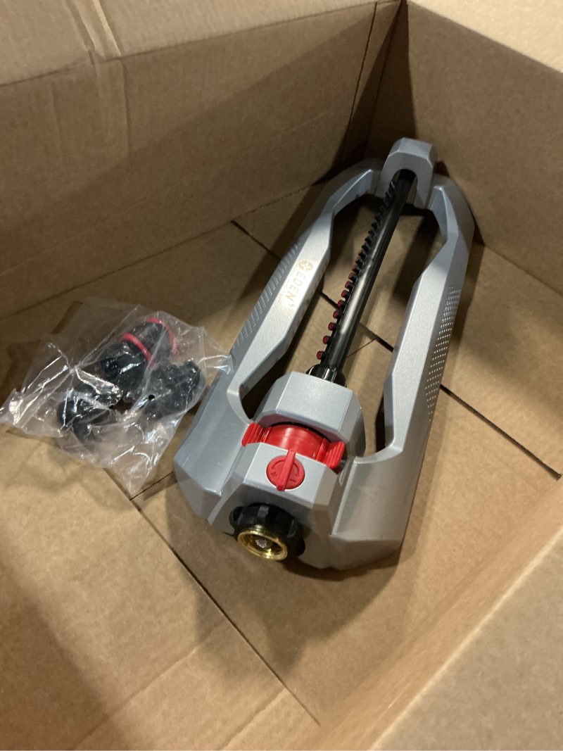 Condition photo showing Good Condition for eden 94111 heavy duty metal oscillating sprinkler, covers up to 3,328 sq. ft., 20 precision nozzles, flow control, adjustable range, quick connect bundle, silver, red, black 20 nozzles metal with flow and range control