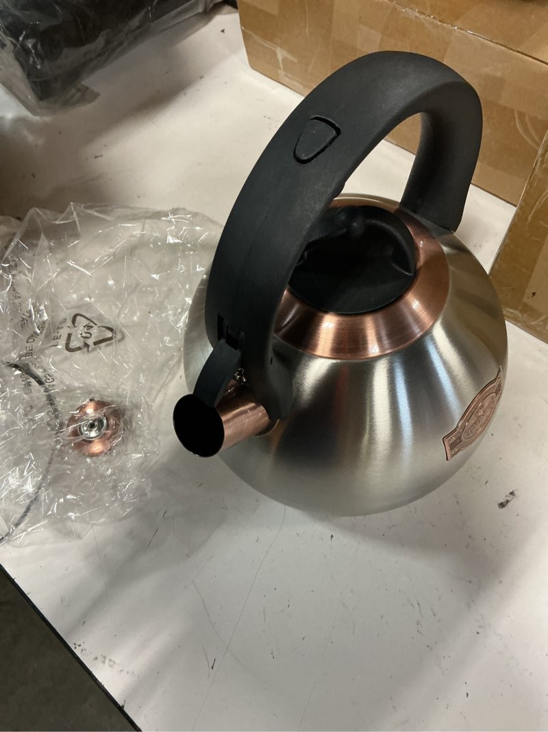 Condition photo showing Good Condition for 3.1 quart teal whistling tea kettle for stove top, food grade stainless steel silver
