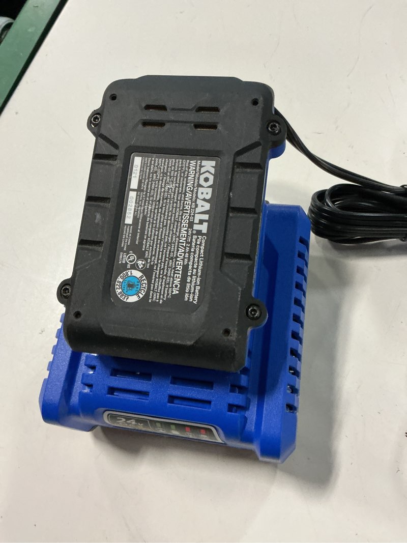 Condition photo showing As Is for kobalt 24v power tool charger with batteries for kobalt tools (1 battery and 1 charger)