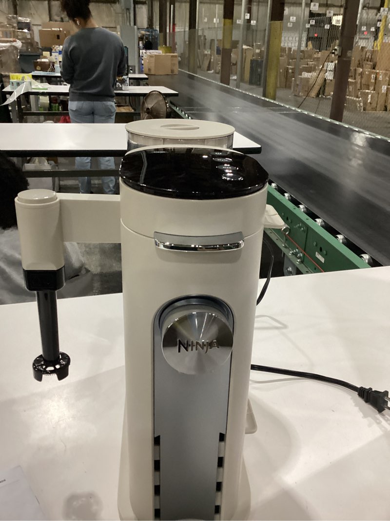 Condition photo showing As Is for NOT TESTED Ninja Pod & Grounds | Coffee Maker | XL Single-Serve | K-Cup Pod Compatible | Brews Grounds | Compact Design | Built-In Milk Frother | 68-oz. Reservoir, 6-oz. Cup to 24-oz. Mug Sizes | Stone |PB055AST