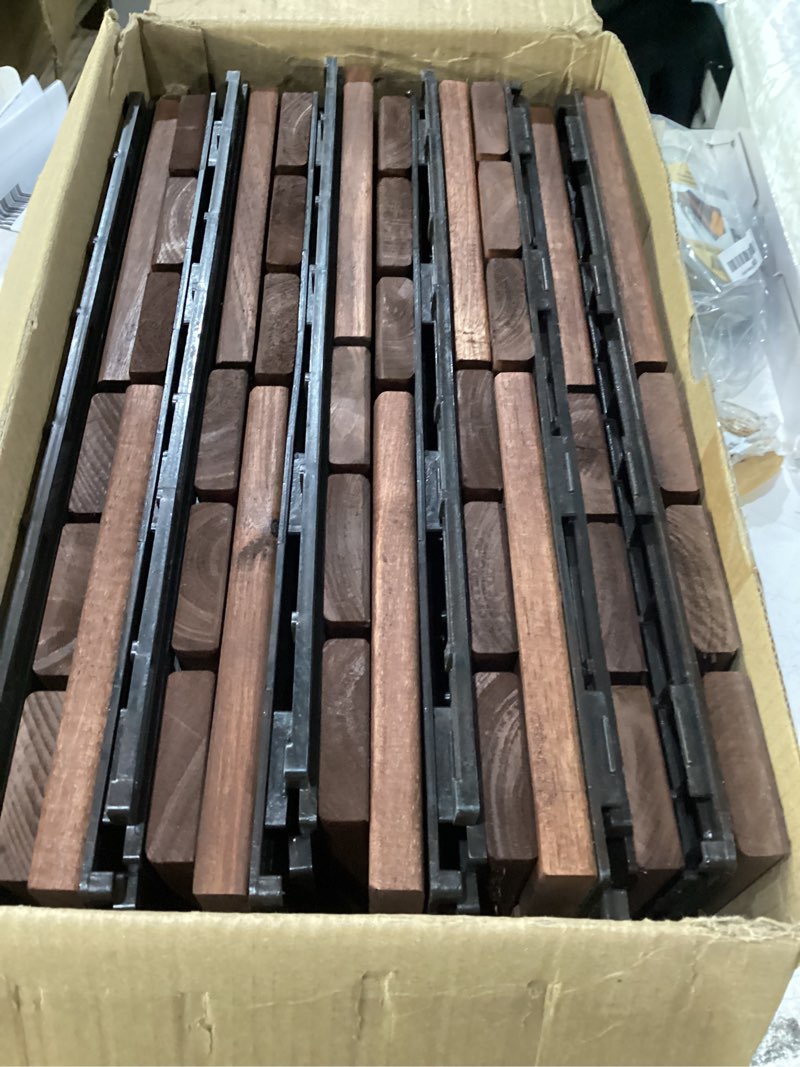 Condition photo showing New/Like New for thyoi premium deck tiles, patio flooring - set 10 pcs 12”x12”x0.9” interlocking deck tiles, waterproof acacia wood for balcony, backyard, indoor & outdoor (brown, crossed pattern, square joints)