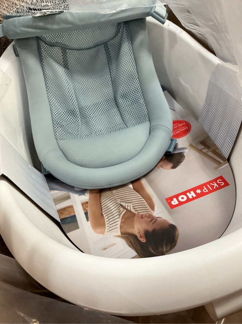 Condition photo showing New/Like New for skip hop baby bath tub 4-in-1 grow with baby infant to toddler bathtub with supportive sling and sit-up support wave age 0m+ wave tub