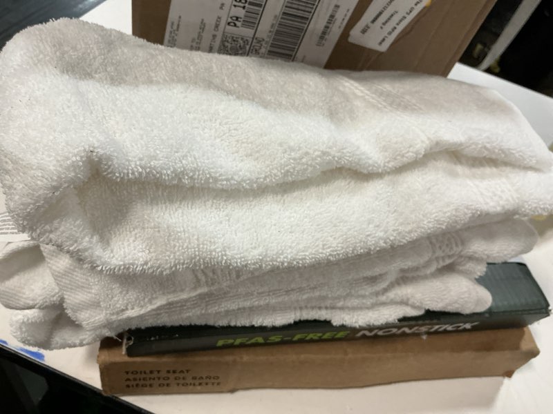 Condition photo showing As Is for utopia towels 6 piece premium hand towels set, 16 by 28 inches, 100% ring spun cotton, lightweight and highly absorbent towels for bathroom, travel, camp, hotel, and spa, white hand towels 6 pack white