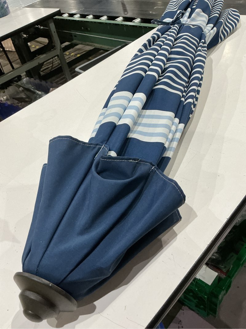 Condition photo showing As Is for allen + roth 9-ft aluminum navy auto-tilt market patio umbrella