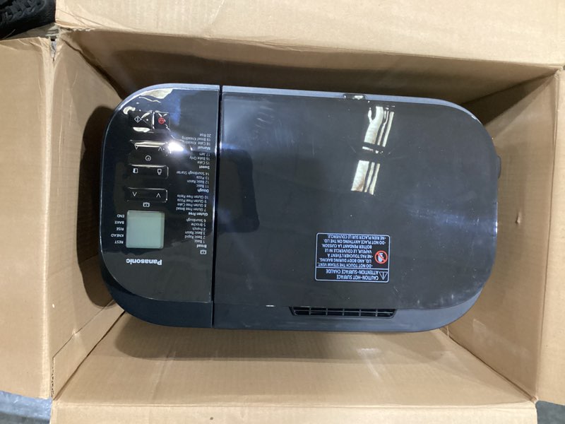 Condition photo showing As Is for panasonic bread machine, automatic bread maker with 20 presets and advanced temperature sensor for bread, cake, and pizza, gluten free baking, raisin nut dispenser - sd-r2550