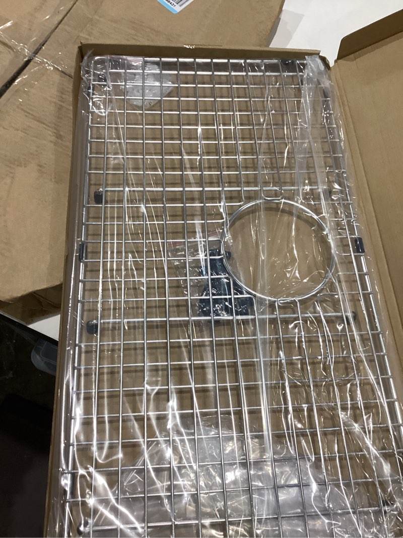 Condition photo showing New/Like New for serene valley sink bottom grid 24-1/8" x 13-1/8", rear drain with corner radius 3/16", sink protector ndg2413r