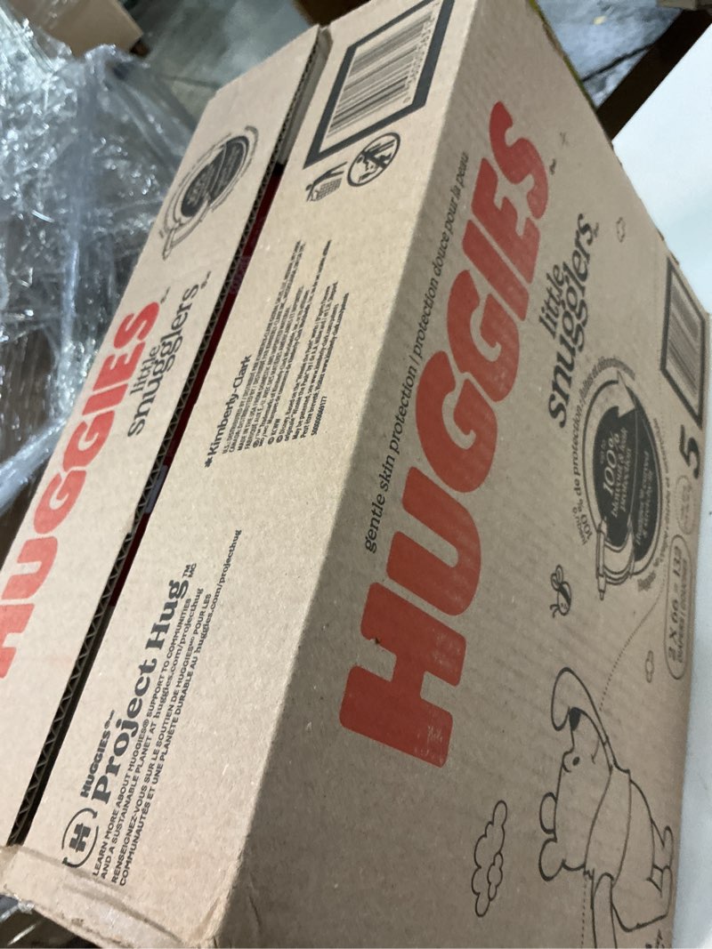 Condition photo showing New/Like New for huggies size 5 diapers, little snugglers baby diapers, size 5 (27+ lbs), 132 count (2 packs of 66), packaging may vary size 5 132