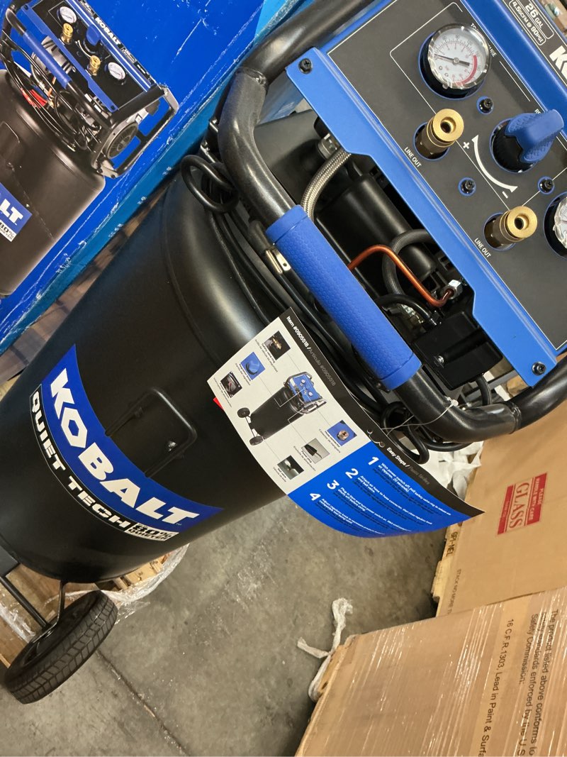 Condition photo showing As Is for kobalt quiet tech 26-gallon portable electric 150 psi vertical air compressor