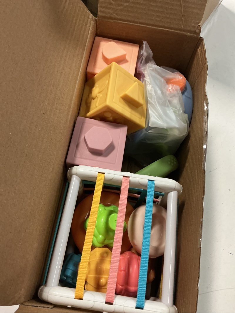 Condition photo showing Good Condition for Montessori Baby Toys - Pull String Teether, Stacking Blocks, Sensory Shapes Storage Bin, Infant Bath Time Fun, 4 in 1 Toddlers Toy for Baby Boys Girls