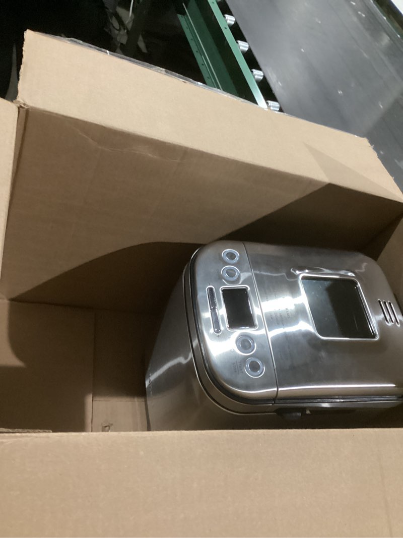 Condition photo showing Good Condition for cuisinart bread maker machine, stainless steel automatic bread machine with 12 menu options, 3 loaf sizes up to 2 lb., 3 crust colors, removable nonstick baking pan & kneading paddle, cbk-110nas