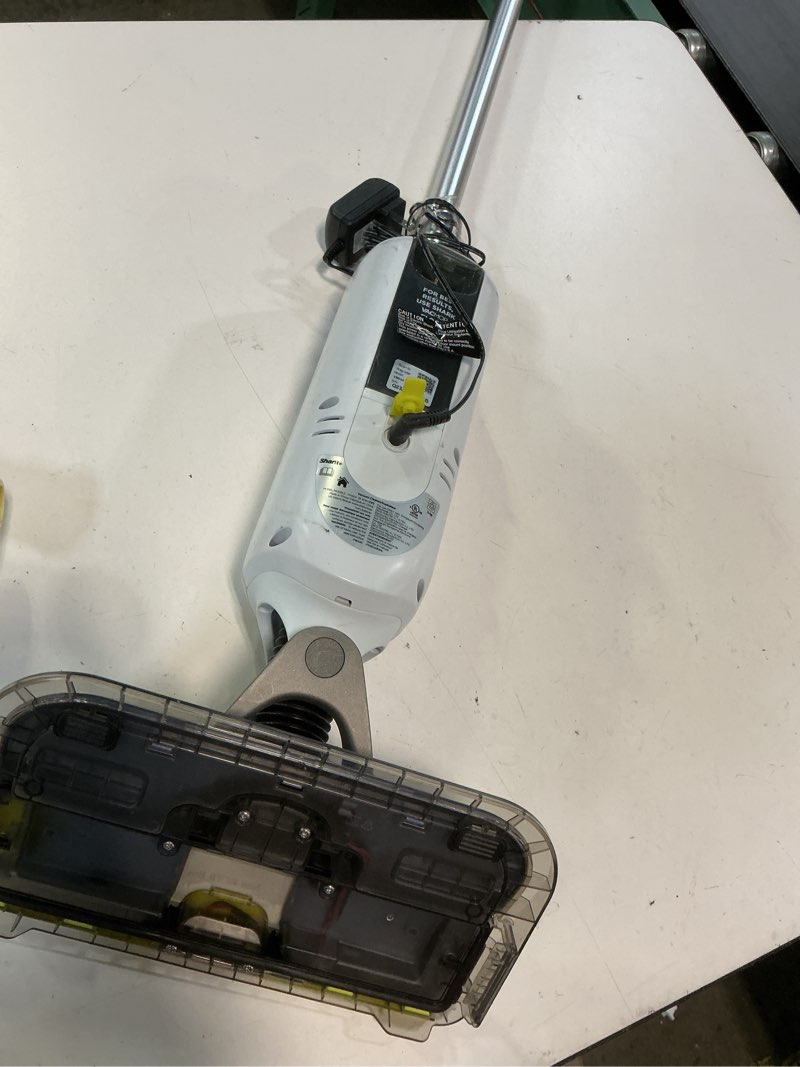Condition photo showing As Is for  shark vacmop reveal new cordless hard floor cleaner, vacuum & spray mop, powerful suction, lightweight, illumination light, includes 4 disposable pads, 12oz pet multi-surface cleaning solution, vm401