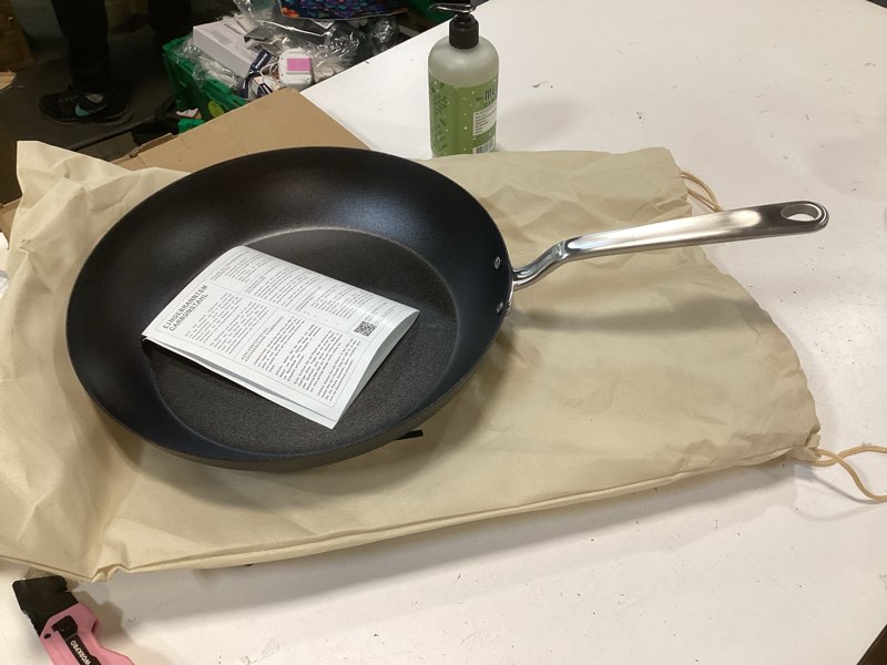 Condition photo showing Good Condition for Made In Cookware - Seasoned 10" Blue Carbon Steel Frying Pan - (Like Cast Iron, but Better) - Professional Cookware - Crafted in Sweden - Induction Compatible 10" Seasoned Carbon Steel Pan