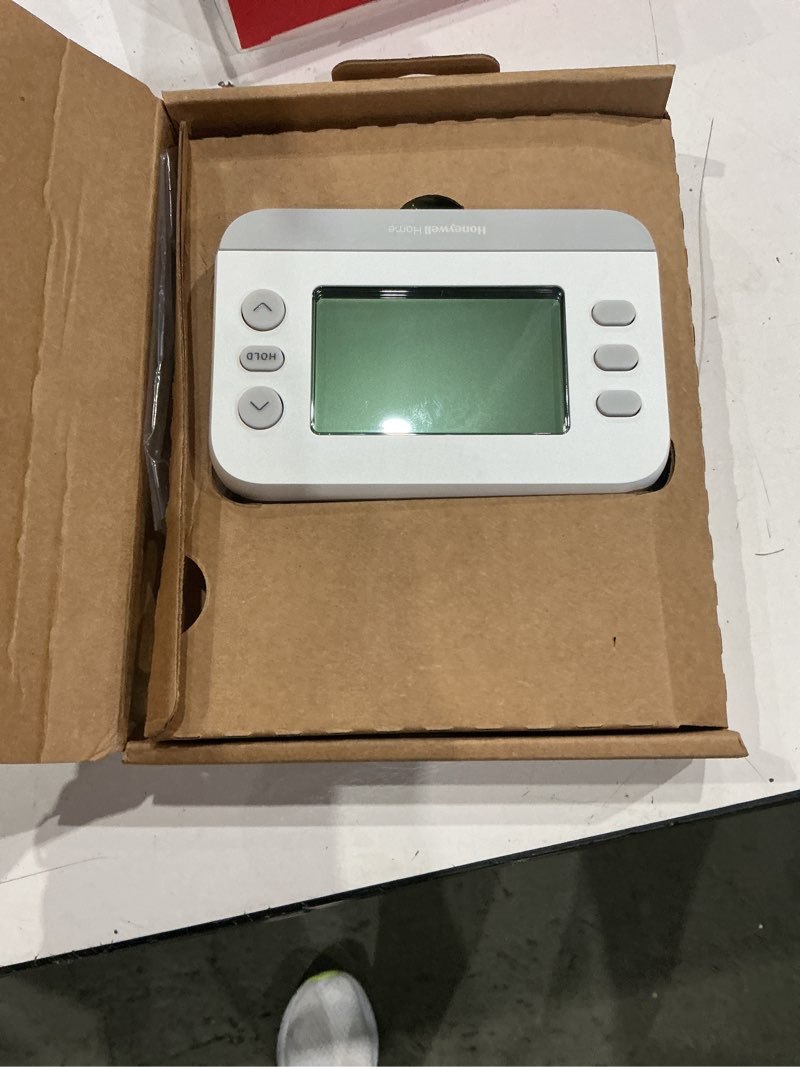 Condition photo showing As Is for honeywell home x2p flex schedule heating and cooling push button programmable thermostat
