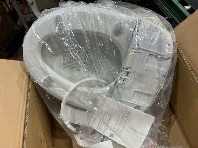 Condition photo showing As Is for brondell se400-rw swash se400 electric bidet toilet seat with heated seat, oscillating stainless steel nozzle, warm air dryer, night light, gentle close lid, white side arm control, round white side arm control round