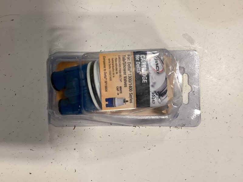 Condition photo showing As Is for danco plastic tub/shower valve cartridge for delta