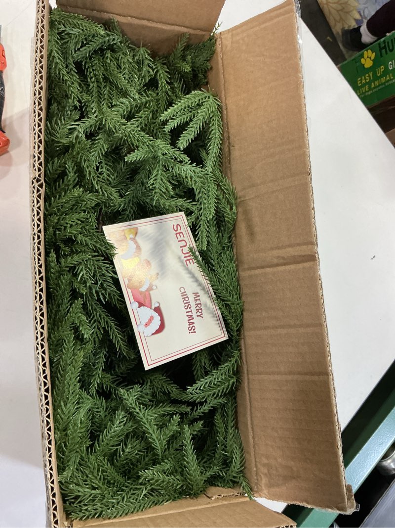 Condition photo showing Good Condition for 9FT Christmas Garland Norfolk Pine Garland Real Touch Artificial Greenery Garland for Mantle Fireplace Table Indoor Outdoor Holiday Decortions (Dark Green) Dark 9FT 1