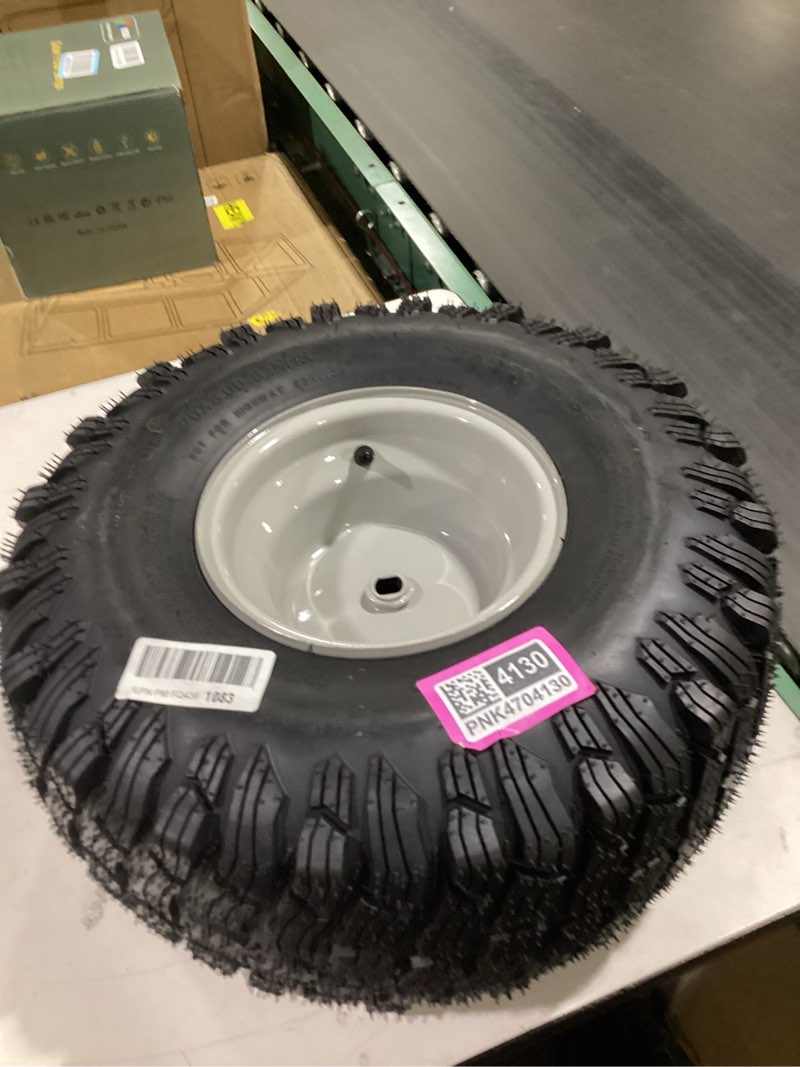 Condition photo showing As Is for 20x8.00-8 lawn mower tire and wheel, 4 ply tubeless tire, 20x8-8nhs riding lawn mower and tractor rear tire and wheel assemblies, 3.5" offset hub, 3/4" borehole, and 3/16" keyway