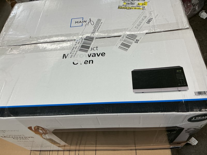 Condition photo showing As Is for mainstays 0.9 cu ft 3-in-1 air fry convection microwave oven, 900 watts