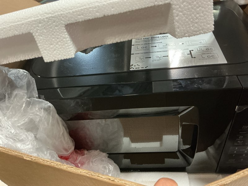 Condition photo showing Good Condition for COMFEE' EM720CPL-PMB Countertop Microwave Oven with Sound On/Off, ECO Mode and Easy One-Touch Buttons, 0.7cu.ft, 700W, Black