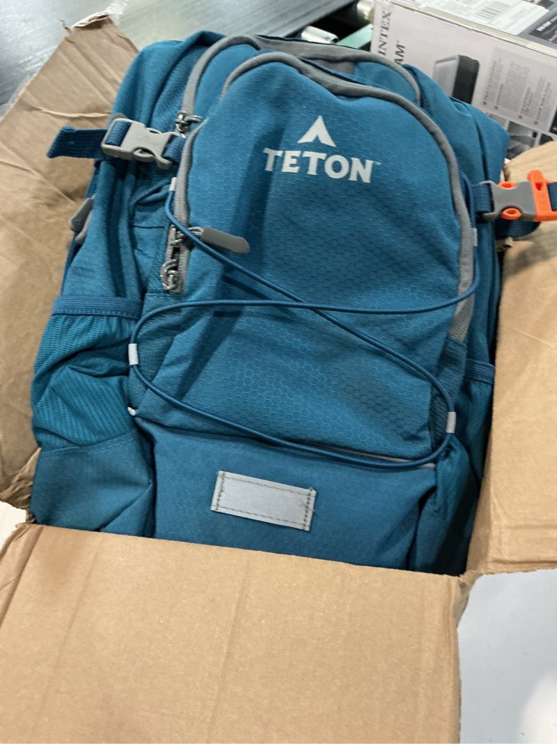 Condition photo showing As Is for teton sports oasis 18l hydration pack with free 2-liter water bladder; the perfect backpack for hiking, running, cycling, or commuting