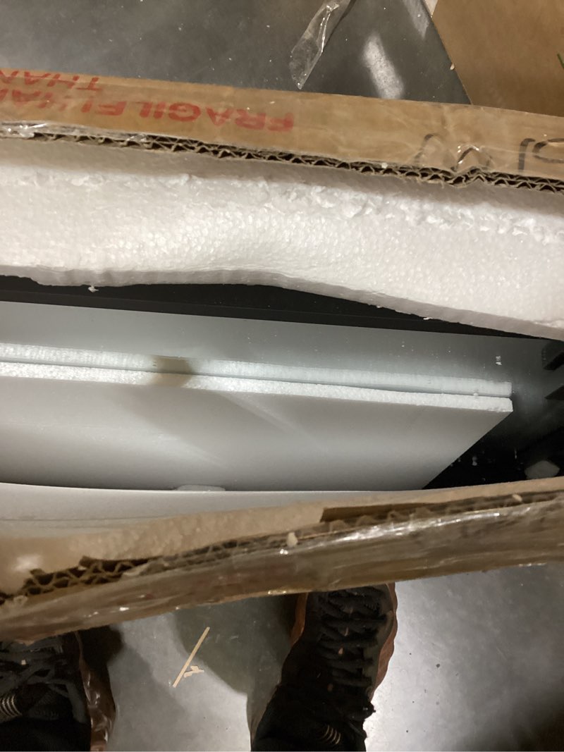 Condition photo showing Good Condition for 20" x 30" Wall Mirror for Living Room Decor, Irregular Black Mirror with Metal Frame, Elegant Decorative Mirror for Entrance, Dining Room, Home Office Black 30"L x 20"W