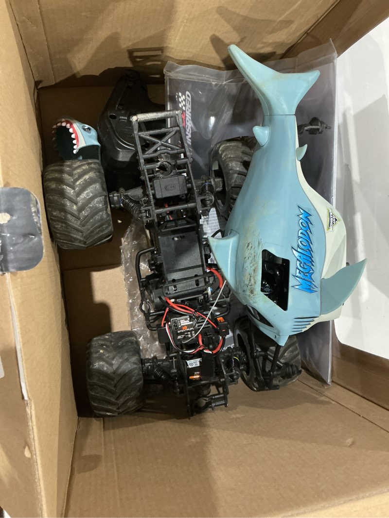 Condition photo showing As Is for losi 1/18 mini lmt megalodon 2s 4x4 rtr brushed monster truck battery & charger included blue los01026t3
