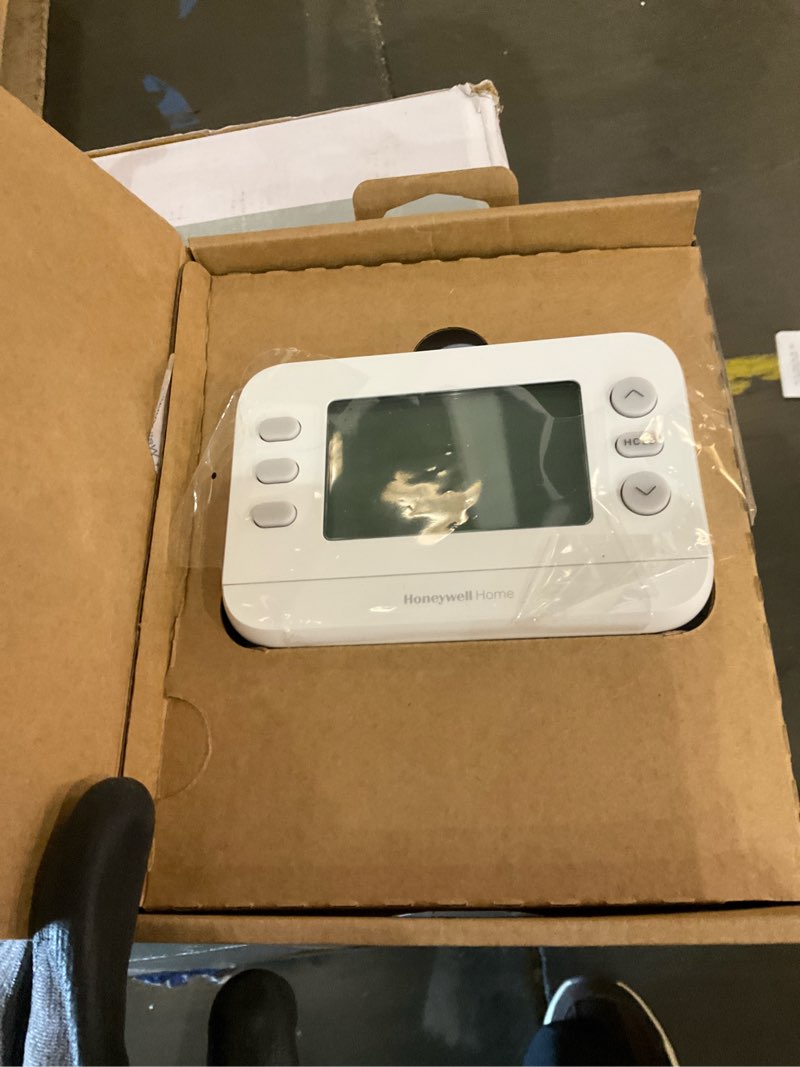 Condition photo showing As Is for new! honeywell home programmable thermostat, single-stage, 1 heat/1 cool compatibility, 5-2 day schedule, x2p, white, rth20b