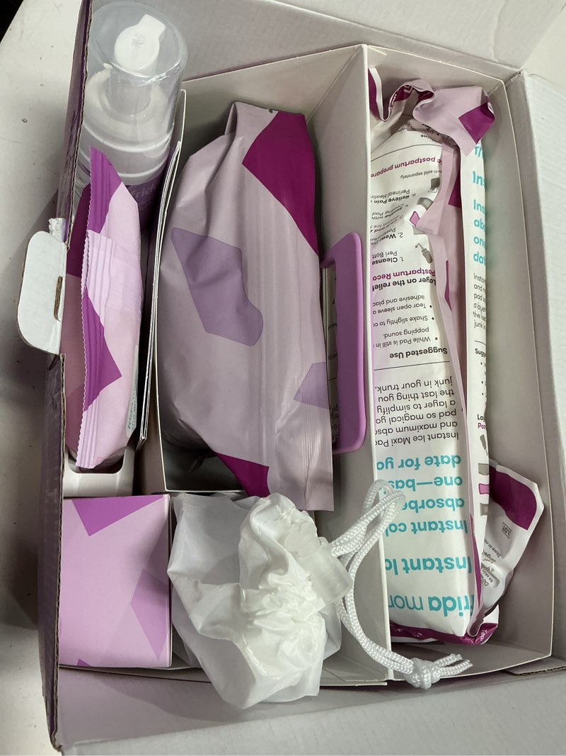 Condition photo showing New/Like New for (Similar)Frida mom