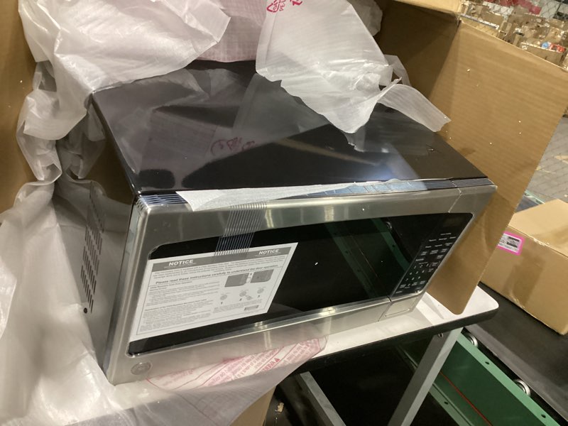 Condition photo showing Good Condition for ge countertop microwave oven,1, 200-watt capacity, 2.0 cubic ft., 8 auto setting cooking settings, child-lock technology, kitchen essentials for the countertop, dorm room or apartment, stainless steel 2.0 cu.ft. stainless steel
