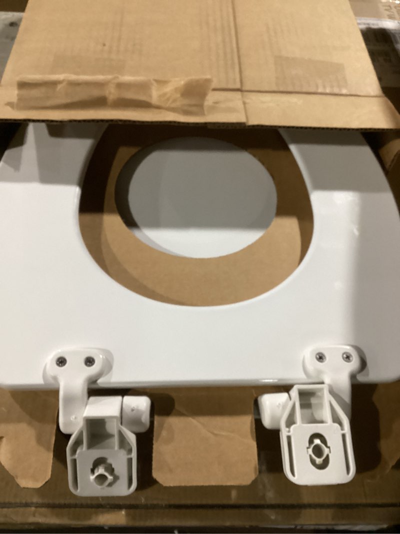 Condition photo showing Good Condition for mayfair linden slow close toilet seat, non slip heavy duty wood, easy install, elongated, white