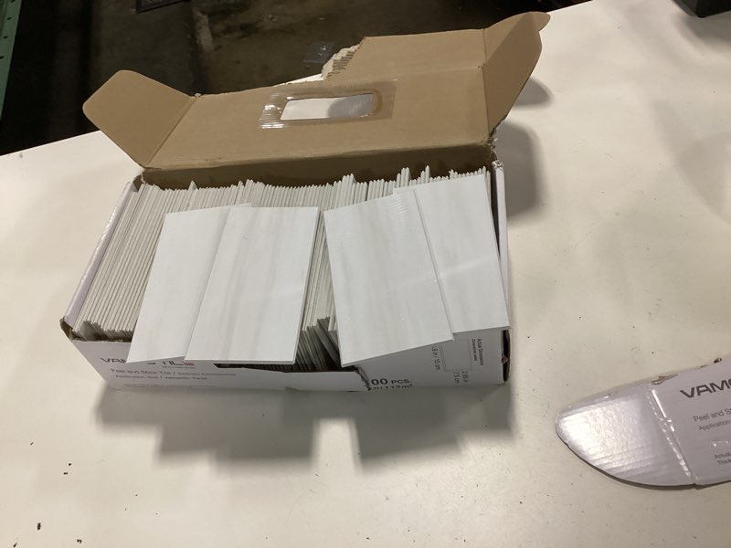 Condition photo showing As Is for vamos tile 100-piece glossy dolomite white peel and stick backsplash tile,3''x6'' pvc subway tile with white grout, stick on backsplash for kitchen/bathroom/fireplace