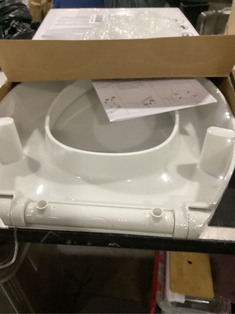 Condition photo showing New/Like New for kohler 25875-0 hyten 3" height, elevated soft close elongated toilet seat, contoured seat with grip-tight bumpers, quick-attach hardware, no slam toilet seat, white white elongated