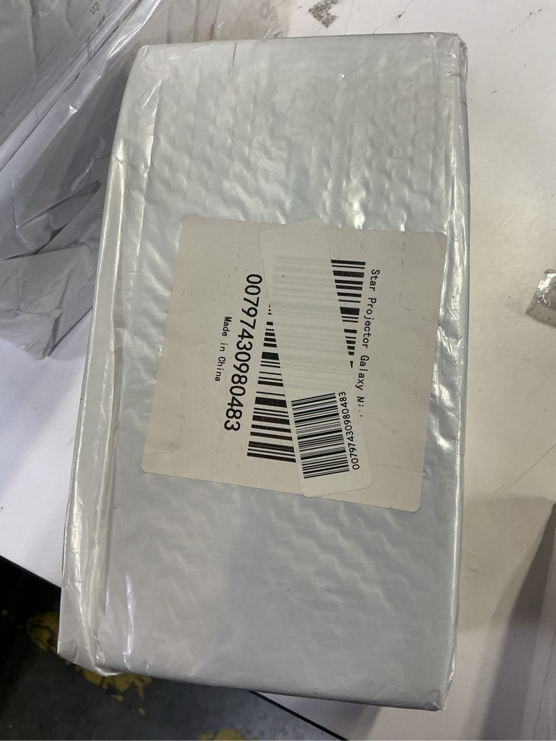 Condition photo showing New/Like New for star projector galaxy night light - astronaut starry nebula ceiling led lamp with timer and remote  gift for kids adults for bedroom  christmas  birthdays  valentine s day