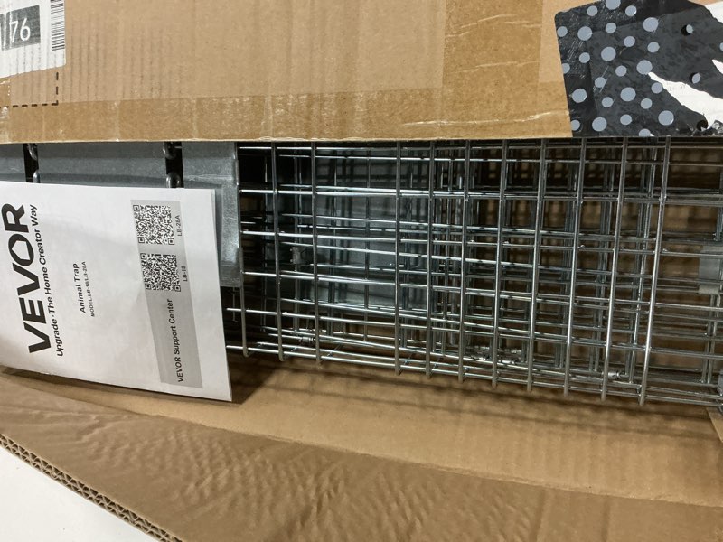 Condition photo showing New/Like New for vevor live animal cage trap, 31" x 10" x 12" humane cat trap galvanized iron, folding animal trap with handle for rabbits, stray cats, squirrels, raccoons, groundhogs and opossums