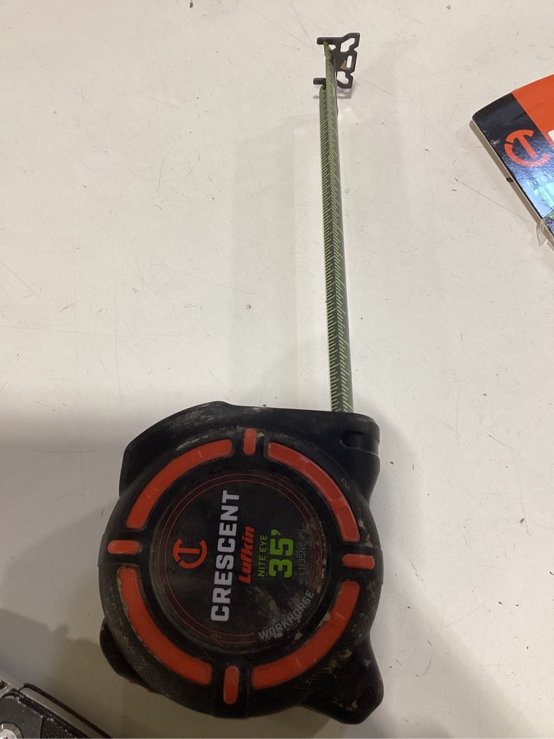 Condition photo showing As Is for crescent lufkin orange workhorse nite eye 35-ft tape measure