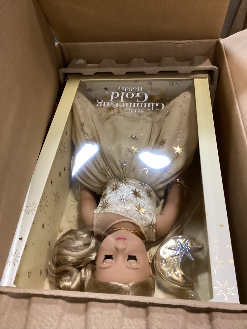 Condition photo showing Good Condition for American Girl 2025 Glimmering Gold Holiday Collector Doll, with Light-Blue Eyes, Long Wavy Blonde Hair, Ages 8+