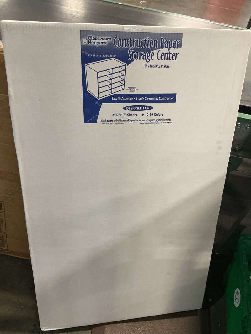 Condition photo showing New/Like New for classroom keepers 12" x 18" construction paper storage, 10-slot, white, 17" h x 27" w x 19" d, 1 unit storage holds 12" x 18" paper