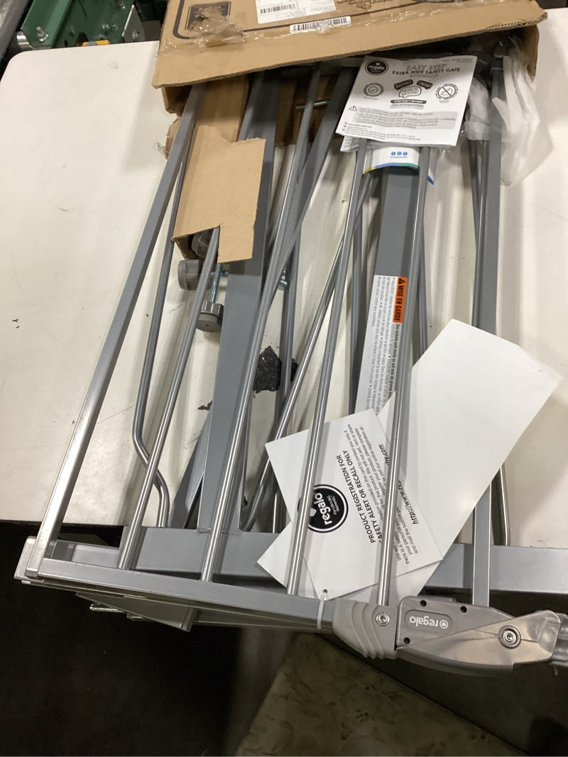 Condition photo showing Good Condition for regalo easy step 49-inch extra wide baby gate, includes 4-inch and 12-inch extension kit, 4 pack of pressure mount kit and 4 pack of wall mount kit, platinum - total pack of 1