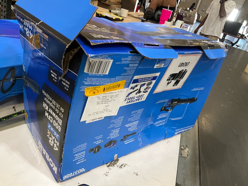 Condition photo showing As Is for kobalt 48v max (24vx2) 600 cfm / 150 mph handheld leaf blower kit, (2) 4.0ah batteries and charger included