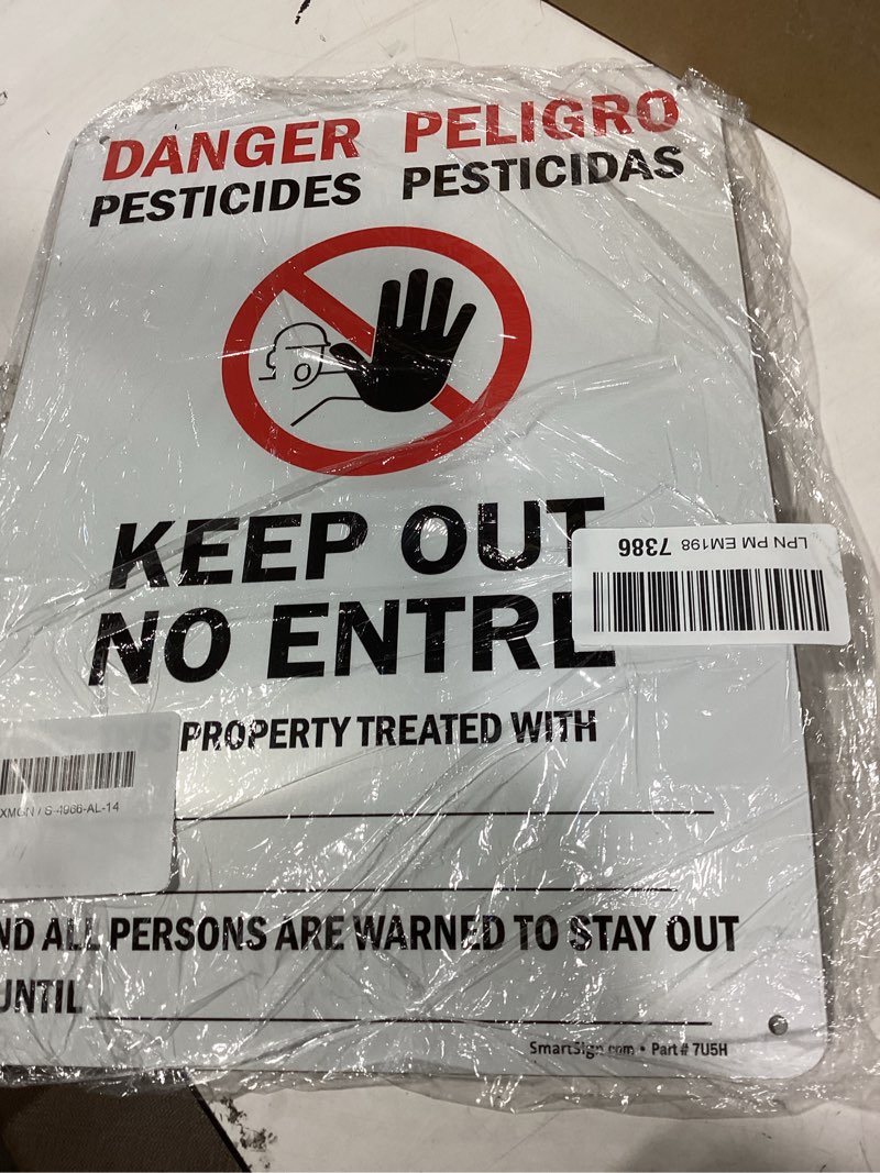 Condition photo showing New/Like New for smartsign "danger - pesticides, keep out" bilingual sign | 10" x 14" aluminum